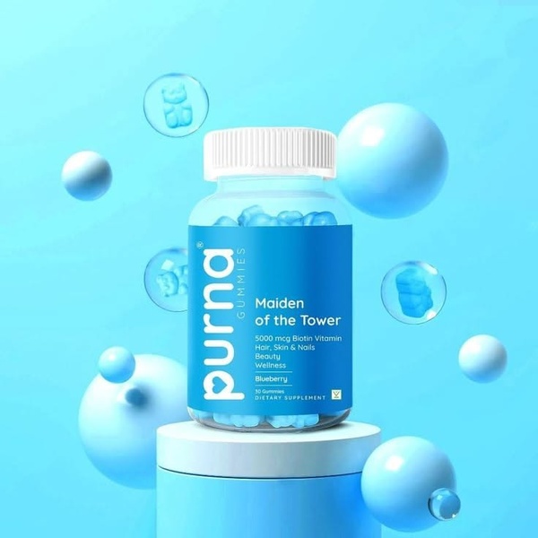 A high-quality 3D render of Purna Biotin Gummies placed on a pedestal, surrounded by floating gummy-themed spheres in a consistent blue color palette.